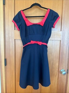 Pinup Couture Navy Dress with Red Trim